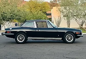 Triumph Stag 1973 года: красота, замаскированная под капот