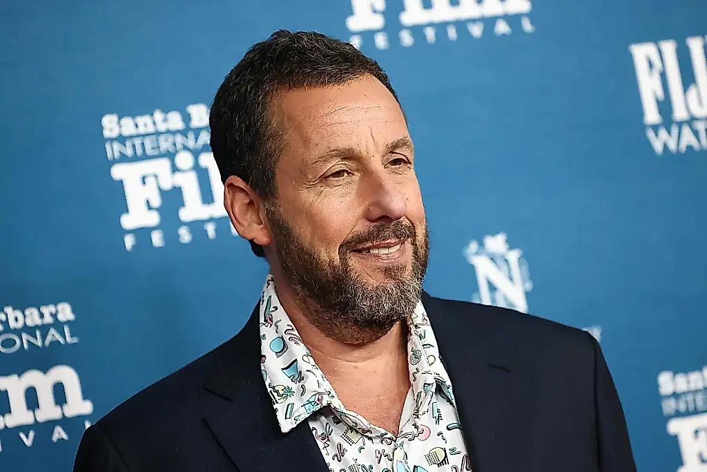Adam Sandler, hombre de guitarra